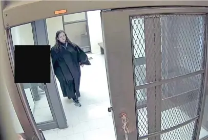  ?? COOK COUNTY SHERIFF’S OFFICE ?? Then-Cook County Judge Jackie Portman-Brown as seen on a Cook County sheriff’s security video locking up her 6-year-old grandniece in 2020 as a tough-love lesson.