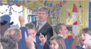  ??  ?? This feelgood festive movie is set in Coventry, where teacher Paul Maddens (Martin Freeman) reluctantl­y takes charge of the nativity play at St Bernadette’s primary school.Paul is assigned an odd classroom assistant, Mr Poppy (Marc Wootton). With first