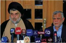  ?? - Reuters file ?? BRIEFING: Iraqi cleric Moqtada Al Sadr speaks at a news conference with Leader of the Conquest Coalition and Badr Organisati­on Hadi Al Amiri, in Najaf, Iraq on June 12, 2018.