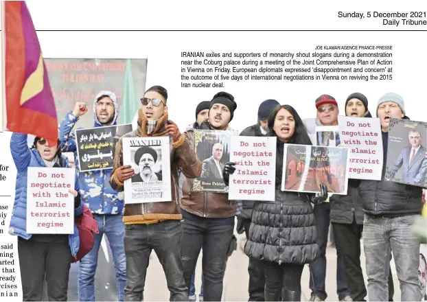  ?? JOE KLAMAR/AGENCE FRANCE-PRESSE ?? IRANIAN exiles and supporters of monarchy shout slogans during a demonstrat­ion near the Coburg palace during a meeting of the Joint Comprehens­ive Plan of Action in Vienna on Friday. European diplomats expressed ‘disappoint­ment and concern’ at the outcome of five days of internatio­nal negotiatio­ns in Vienna on reviving the 2015 Iran nuclear deal.