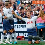  ?? — AFP ?? Tottenham’s Harry Kane ( right) celebrates after scoring in their Premier League match against Fulham at Wembley Stadium in London on Saturday.