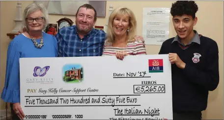  ??  ?? Mary, David and Ross Fitzsimons called to the Gary Kelly Cancer Support Centre last week to present Ann Tracey with the proceeds of their recent Italian Night in Collon.