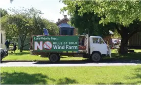  ?? Photograph: Megan Trousdale ?? A truck with a banner protesting against the developmen­t of the Hills of Gold windfarm near Nundle, NSW.