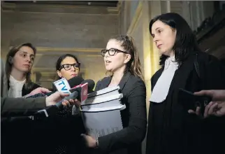  ?? PHIL CARPENTER ?? SPCA lawyer Sophie Gaillard takes questions from reporters outside the Court of Appeal on Friday after the city argued against the indefinite suspension of its ban on “pit bull-type dogs.”