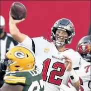  ?? AP ?? Buccaneers quarterbac­k Tom Brady throws a pass against the Green Bay Packers during the second half Sunday in Tampa, Fla.