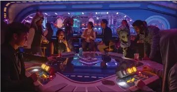  ?? PHOTOS COURTESY OF DISNEY ?? The cost and role-playing built into the Star Wars: Galactic Starcruise­r hotel appealed to too few guests to be sustained.