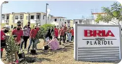  ?? ?? With Bria Homes’ Plantahan program, tree planting has become a regular activity in many Bria residentia­l communitie­s.