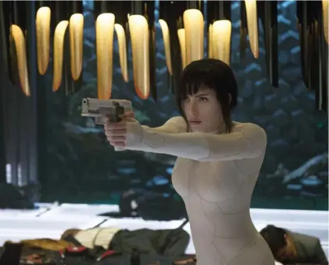  ?? JASIN BOLAND/PARAMOUNT PICTURES AND DREAMWORKS PICTURES ?? Scarlett Johansson as Major in Ghost in the Shell, a character that was Asian in the manga the film is based on.