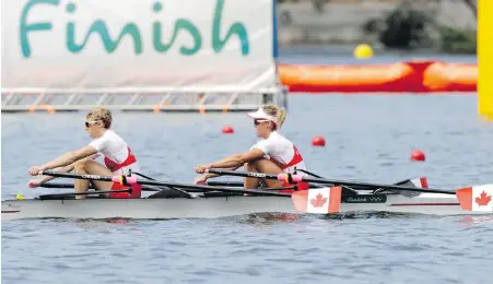  ??  ?? Canadians Lindsay Jennerich, left, and Patricia Obee cruise across the finish line during a women’s lightweigh­t double sculls heat in Rio de Janeiro on Monday. The pair advanced to the semifinals.