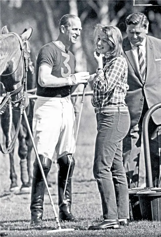  ??  ?? The Princess Royal has a joke with her father at Smith’s Lawn, Windsor Great
Park, above; the Royal family at Balmoral, left