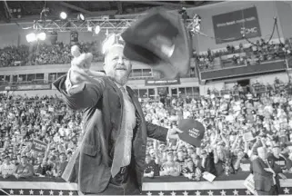  ?? JABIN BOTSFORD/THE WASHINGTON POST ?? Brad Parscale, President Donald Trump’s 2020 campaign manager, throws out hats before a rally in Manchester, New Hampshire.