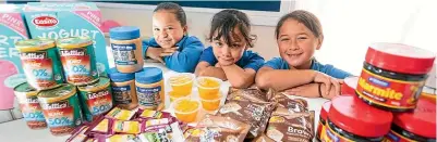  ?? SIMON O’CONNOR / STUFF ?? Tumuaki o Te Pi’ipi’inga Kakano Mai i Rangiatea Kura Kaupapa Ma¯ori get support from KidsCan so their 110 tamariki can be fed throughout the week and not come to school hungry. From left are 8-year-olds Sharnelle Ratana- Chase, Tomairangi Eriwata-Adams and Herengaran­gi Wharehoka.