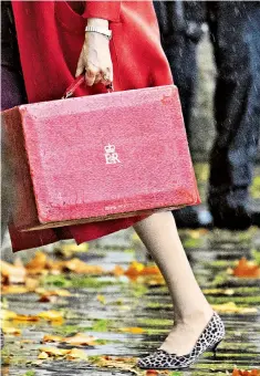  ??  ?? The burdens of office: Mrs May this week taking the back way into Downing Street