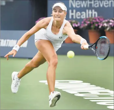  ?? Peter Hvizdak / Hearst Connecticu­t Media ?? Ekaterina Makarova returns a volley against Karolina Pliskova during the Connecticu­t Open on Monday. Makarova won 6-1, 6-3.