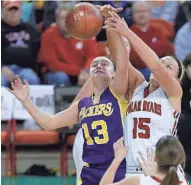  ?? MARK HOFFMAN / MILWAUKEE JOURNAL SENTINEL ?? Cudahy’s Kaytlin Sagan (left) and Hortonvill­e’s Lexi Walter battle for a rebound in a Division 2 semifinal on Friday.