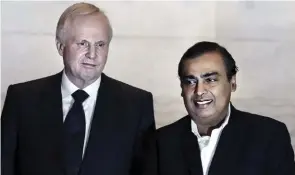  ??  ?? (L) Bob Dudley, CEO, BP, with RIL chief Mukesh Ambani