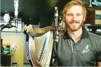  ??  ?? Landlord: Gareth Steenson behind the bar