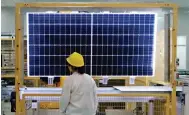  ?? Photo: Reuters ?? A Longi Green factory making solar equipment in Xian. It was one of four companies identified in the US investigat­ion.