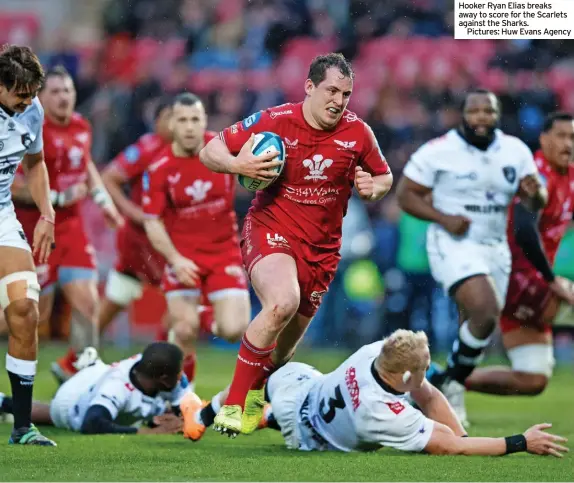  ?? ?? Hooker Ryan Elias breaks away to score for the Scarlets against the Sharks.
Pictures: Huw Evans Agency