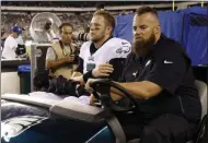  ?? MICHAEL PEREZ - THE ASSOCIATED PRESS ?? Philadelph­ia Eagles’ Nate Sudfeld is driven off the field after an injury during the first half of the team’s preseason NFL football game against the Tennessee Titans, Thursday, Aug. 8, 2019, in Philadelph­ia.