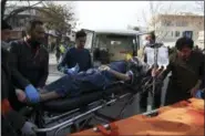  ?? THE ASSOCIATED PRESS ?? An injured man is moved on a stretcher outside a hospital following a suicide attack in Kabul, Afghanista­n, Saturday Jan. 27, 2018. A suicide car bomber killed at least 40 people and wounded about 140 more in an attack claimed by the Taliban on...