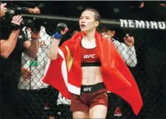  ?? STR/AFP ?? UFC champion Zhang Weili is agonising over her second Covid shot as she wants nothing to disrupt preparatio­ns for her title defence.