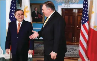  ??  ?? WASHINGTON MEETING – US Secretary of State Mike Pompeo (right) greets Philippine Foreign Affairs Secretary Teodoro Locsin at the State Department in Washington Thursday. The two discussed regional issues including the situation in the Korean peninsula and the dispute in the South China Sea. (AP)