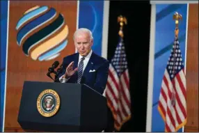  ?? (AP/Evan Vucci) ?? President Joe Biden answers reporters’ questions Friday after delivering closing remarks at the virtual Summit for democracy. Video at arkansason­line.com/1211whsumm­it/.