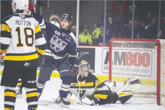  ?? DAX MELMER ?? Windsor’s Daniel D’amico celebrates after a first-period goal against the Kingston Frontenacs at the WFCU Centre on Sunday. The Spitfires won in a 10-2 rout.