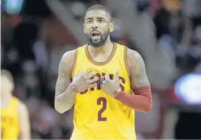  ?? TONY DEJAK/AP ?? Kyrie Irving wants out of Cleveland and has named the Heat among his favored destinatio­ns. Ira Winderman says the Heat owe it to themselves to pursue him if possible.