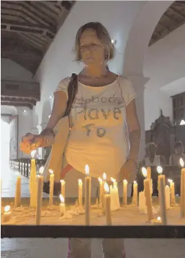  ?? AP PHOTOS ?? HIGHER POWER: A woman, above, prays at a church for protection against Hurricane Irma, in Caibarien, Cuba, Friday.