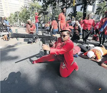  ?? /THULI DLAMINI ?? Abahlali baseMjondo­lo, seen here during a march, say the planned protest by Affected Residents Movement has nothing to do with land.