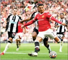  ?? Photo: AFP ?? Ronaldo scores his and United’s second goal in the 4-1 win against Newcastle last Saturday (Sept 11).