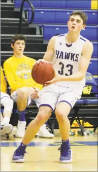  ?? Richard Gregory /For Hearst Connecticu­t Media ?? Newtown’s Robert DiSibio lines up a shot against Stratford at Newtown High School on Feb. 20.