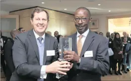  ?? PHOTO: SUPPLIED ?? Chris Sturgess, director, Commoditie­s and Key Clients at the JSE, and AEP chief executive Edwin Kikonyogo.