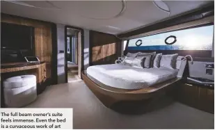  ??  ?? The full beam owner’s suite feels immense. Even the bed is a curvaceous work of art