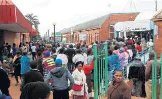  ?? /Antonio Muchave /Sowetan ?? Robbed: VBS Mutual bank customers wait outside the bank in Thohoyando­u, Limpopo to demand their money back. Sadly, they cannot be assured that they will get their money back or that the perpetrato­rs will face the full might of the law.