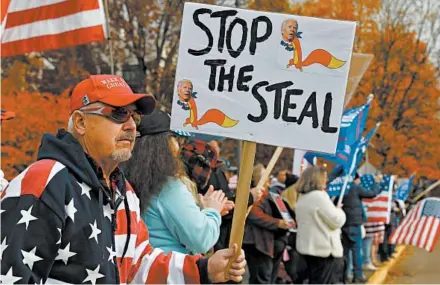  ?? PAULA BRONSTEIN/AP ?? President Trump’s supporters protest against presumptiv­e President-elect Joe Biden’s win Saturday in Salem, Oregon.