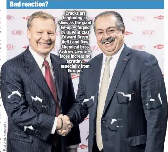  ??  ?? Cracks are beginning to show as the giant tie-up — forged by DuPont CEO Edward Breen (left) and Dow Chemical boss Andrew Liveris — faces increasing scrutiny, especially from Europe.