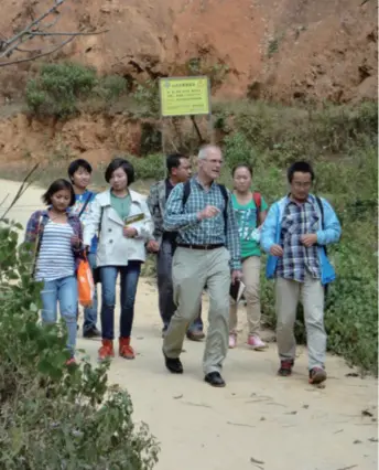  ??  ?? Michael Hermann with his colleagues in Zhenkang County in Yunnan Province, southwest China
