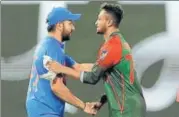  ?? AP ?? Both Rohit (L) and Shakib were effusive in praise of Karthik.