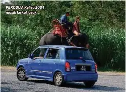  ??  ?? PERODUA Kelisa 2001 masih kekal lasak.