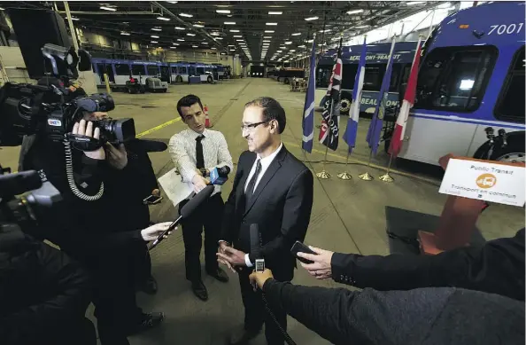  ?? IAN KUCERAK ?? Amarjeet Sohi, the federal minister of Infrastruc­ture and Communitie­s, speaks during the announceme­nt of funding for 40 electric buses at the Edmonton Transit Service’s Centennial Garage on Friday. The buses are more expensive than diesel buses...