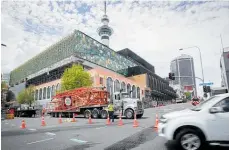  ?? Photo / Jason Oxenham ?? Road restrictio­ns are set to ease after the fire in the New Zealand Internatio­nal Convention Centre.