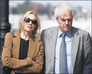  ?? Michael Dwyer / Associated Press file photo ?? In this May 22 photo, Marcia, left, and Gregory Abbott leave federal court after they pleaded guilty to charges in a nationwide college admissions bribery scandal.