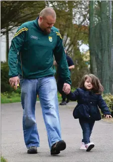  ??  ?? You’re never to young to start - two -year-old Jade Julian from Listowel, with her dad Jason, enjoying Sunday’s stroll in Listowel in aid of TLC4CF