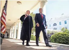  ?? JIM LO SCALZO, EUROPEAN PRESSPHOTO AGENCY ?? President Trump, here with Supreme Court Justice Anthony Kennedy, made 10 nomination­s Monday to federal courts.