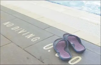  ?? Herald file photo ?? Taking a dip in the Penticton Community Centre pool will cost an extra five per cent next year, although families will get a break.