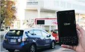  ?? RICHARD LAM/PNG FILES ?? Ride-hailing services like Uber won’t be up and running in B.C. for another nine to 12 months.