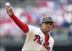  ?? MATT ROURKE - THE ASSOCIATED PRESS ?? The Phillies’ Taijuan Walker pitches during the first inning of a game against the Chicago Cubs, Sunday, May 21, 2023, in Philadelph­ia.